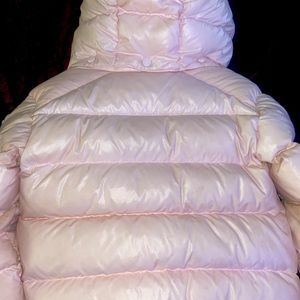 Authenticated Moncler Coat.